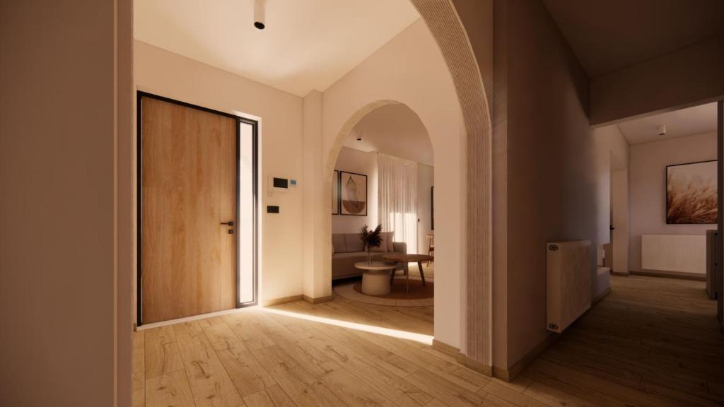 a hallway with a door leading to a bathroom at Theo's Garden Villa in Kefalos