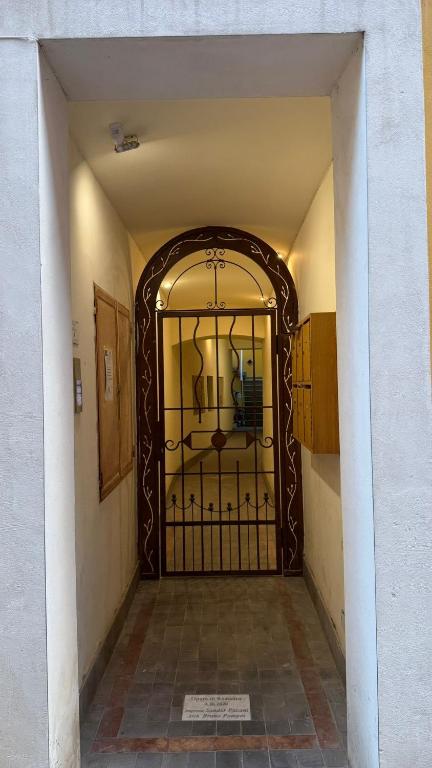 an entrance to a hallway with an iron gate at La Casa di Stela 2 in Terni