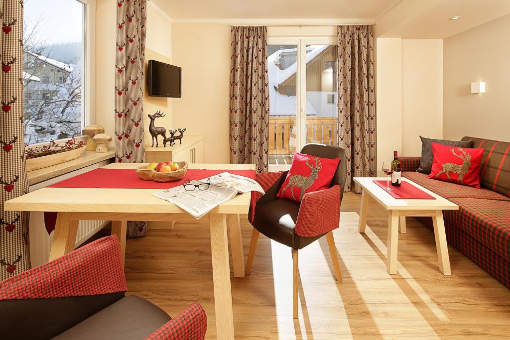 TV a/nebo společenská místnost v ubytování Hotel Wiedemann
