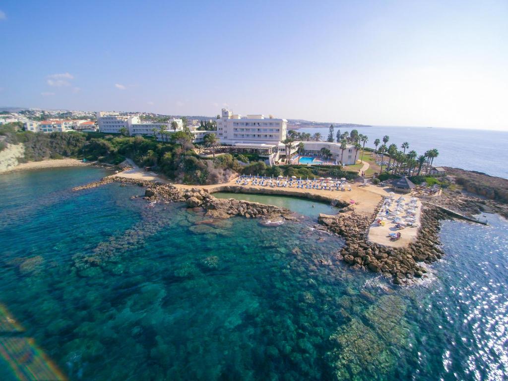 an aerial view of a beach with a resort at Cynthiana Beach Hotel in Paphos