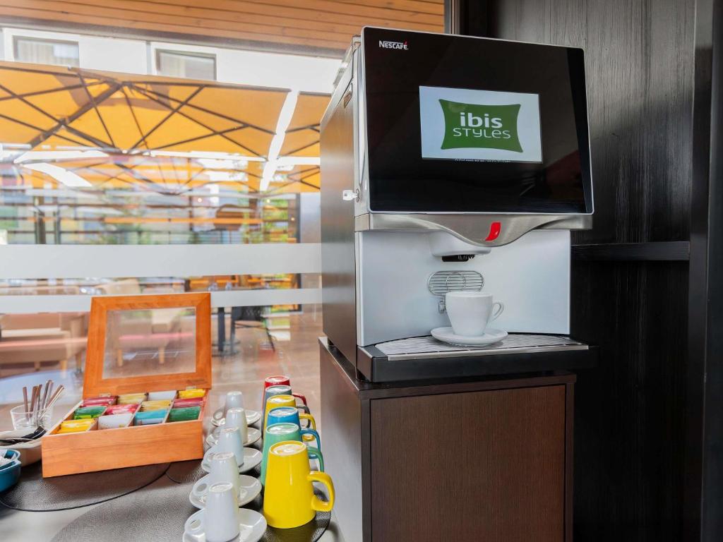 A self-service coffee station in the breakfast area.