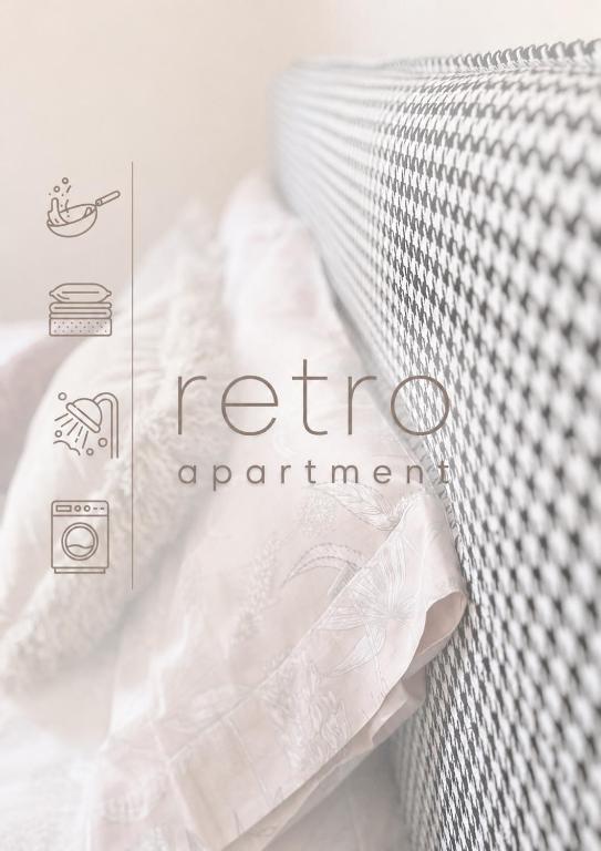 a mattress with a sign that reads her apartment at Retro Apartment Patras in Patra