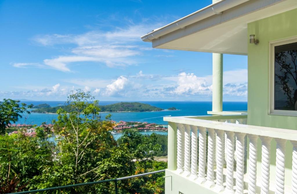 a balcony of a house with a view of the ocean at Elegant Villa with Sea View in Victoria in Victoria