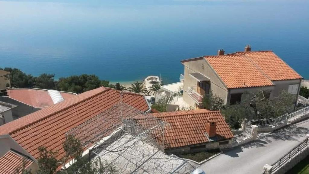 an aerial view of a house with red roofs at Stanka in Podgora