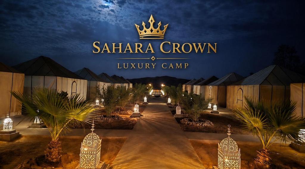 a sign that reads santa ana crown luxury camp at Sahara Crown Luxury Camp in Merzouga