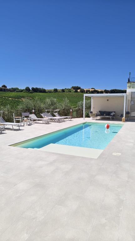 a swimming pool in a villa with a view at Ripamè B&B in Ripa Teatina