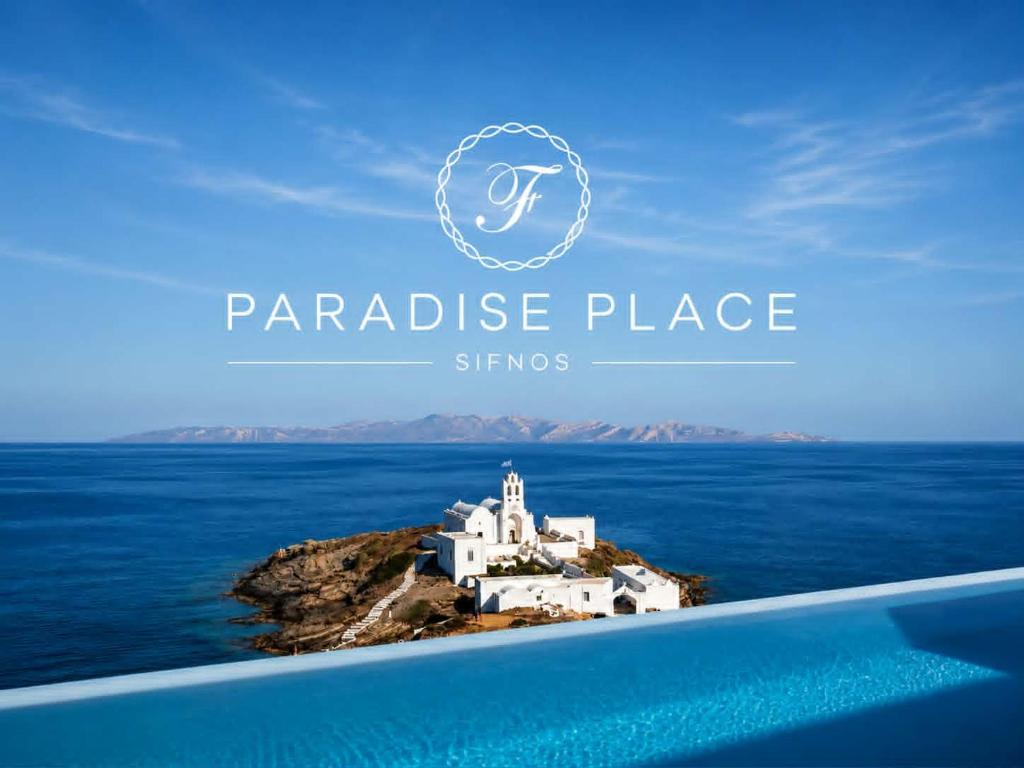 a view of a small island in the ocean at Paradise Place Sifnos in Chrisopigi
