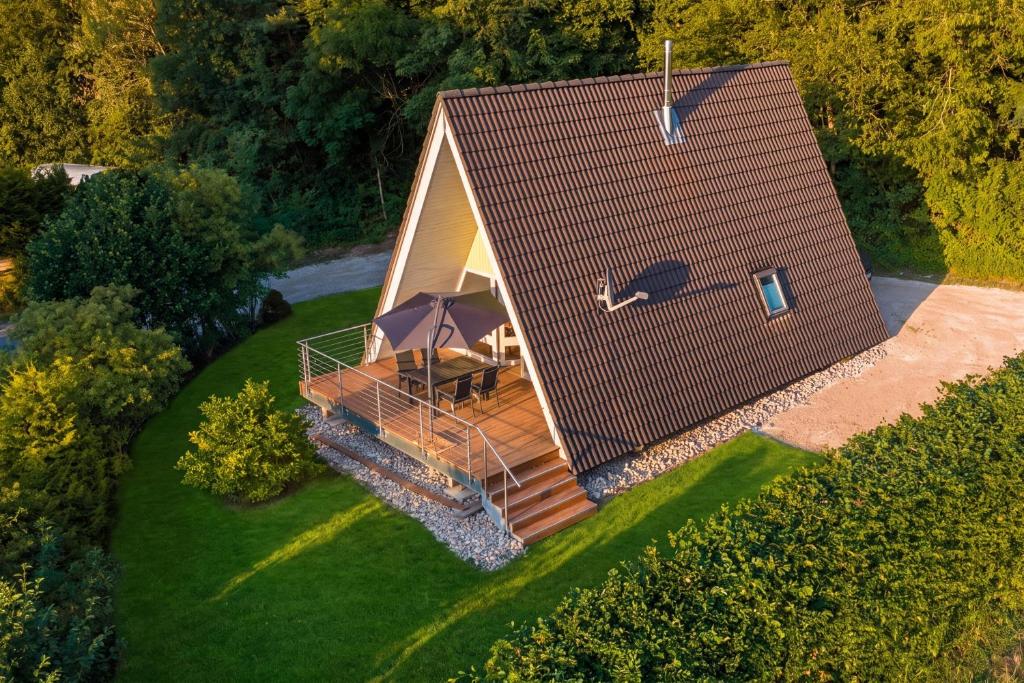 an overhead view of a tiny house with a deck at Ferienhäuser Campingplatz in Kinding