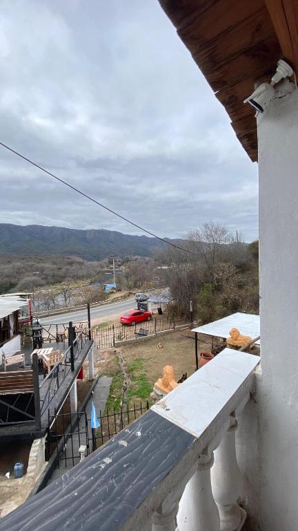 a balcony of a building with a view of a road at Terrazas Jorge y Claudia in Bialet Massé