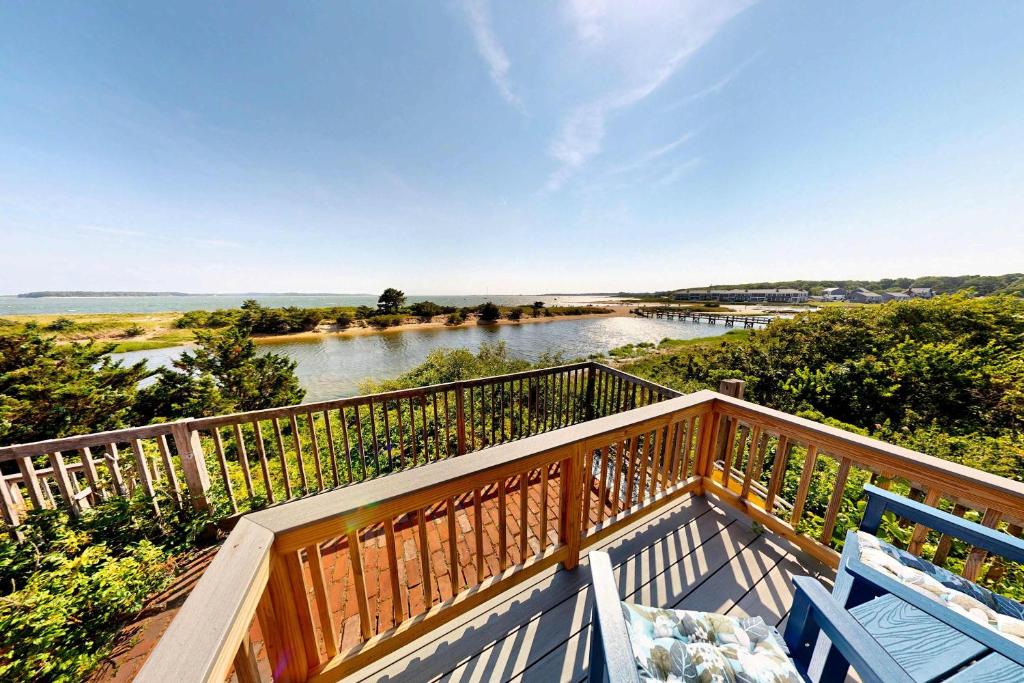 a balcony with a view of a river at The Atlantic in Yarmouth
