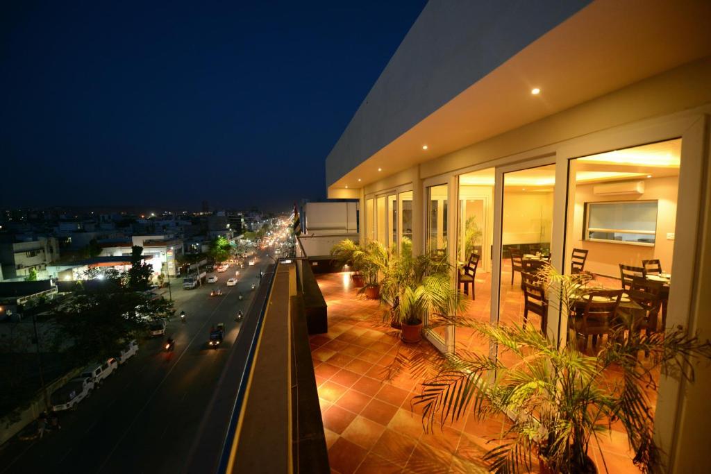 a building with a view of a street at night at Silver Pride Boutique Hotel in Jaipur