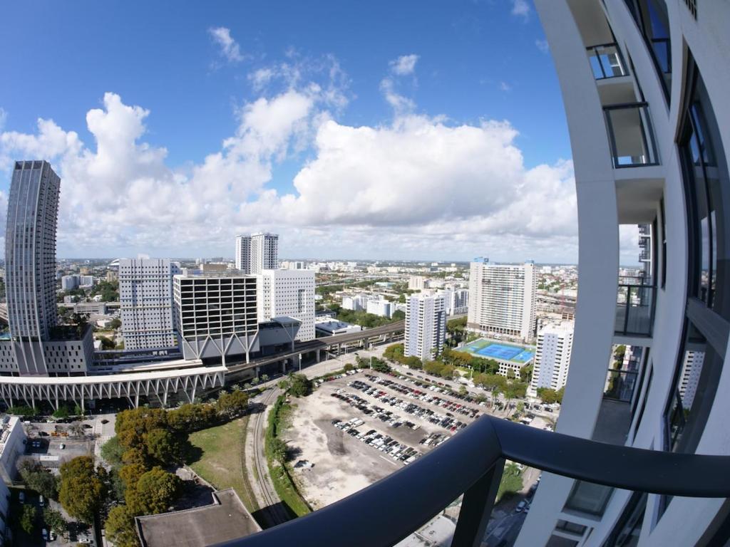 a view of the city from the balcony of a building at C5103 Outstanding Studio in the Heart of Downtown in Miami
