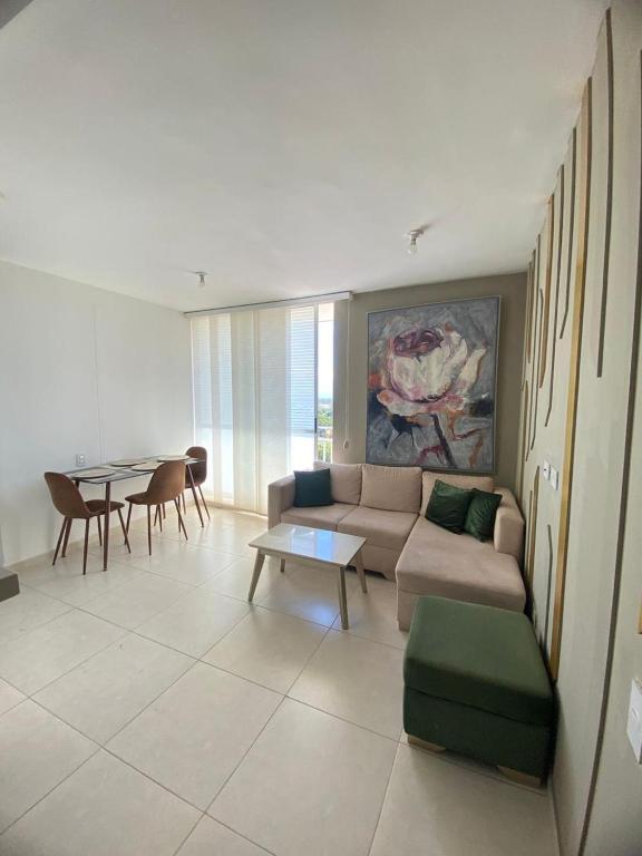 a living room with a couch and a table at Valparaiso in Valledupar