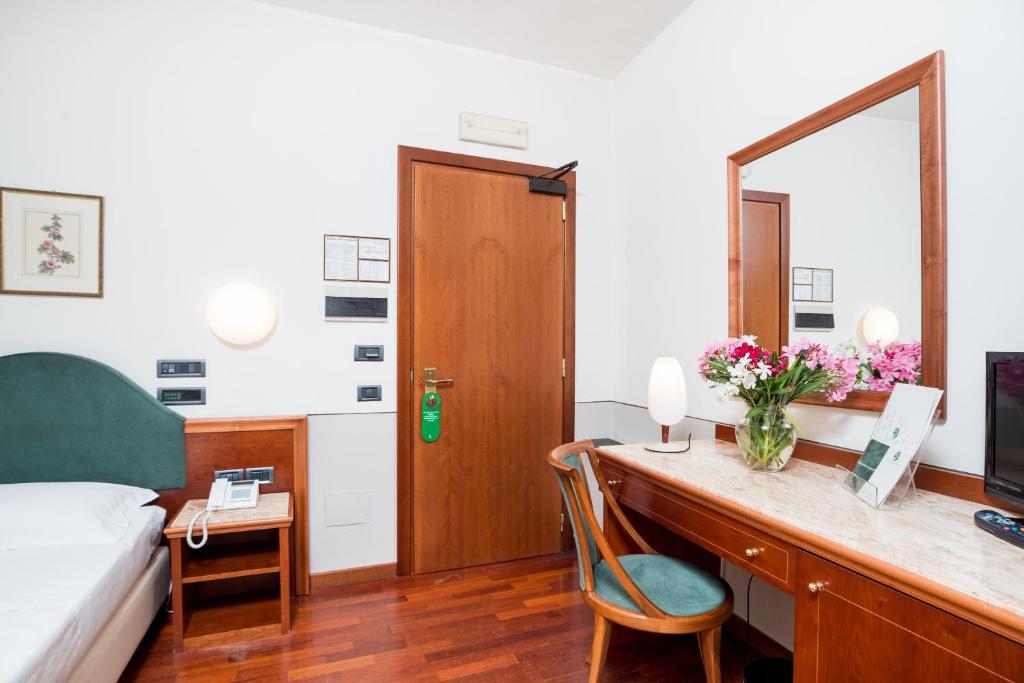 TV a/nebo společenská místnost v ubytování Terra Umbra Hotel