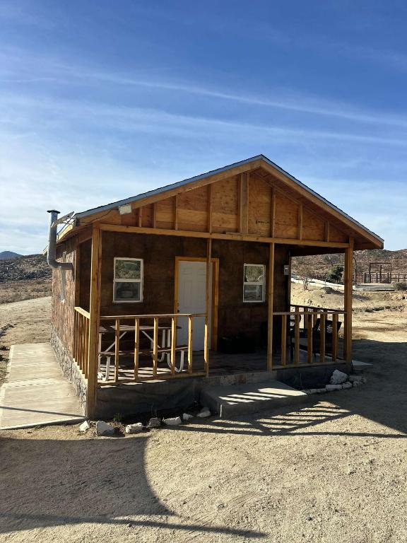 a wooden building in the middle of the desert at #11- Rancho Meling in Camalú