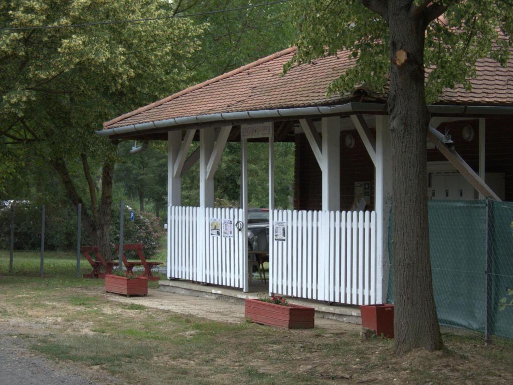 a white gazebo with a brown roof at Szentkút Kemping Vasvár in Vasvár