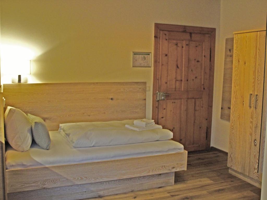 Postel nebo postele na pokoji v ubytování Mammhofer Suite & Breakfast