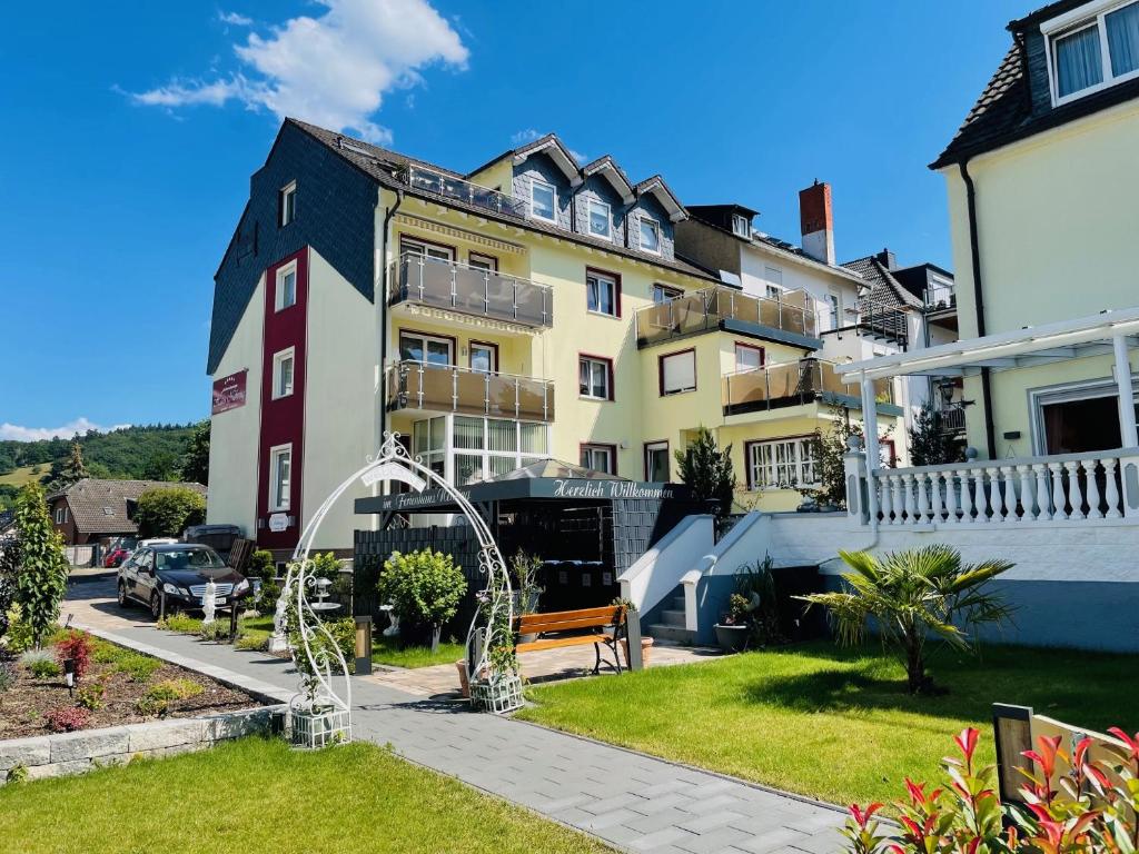 a building with a fountain in front of it at Ferienhaus Nehring in Bad Neuenahr-Ahrweiler
