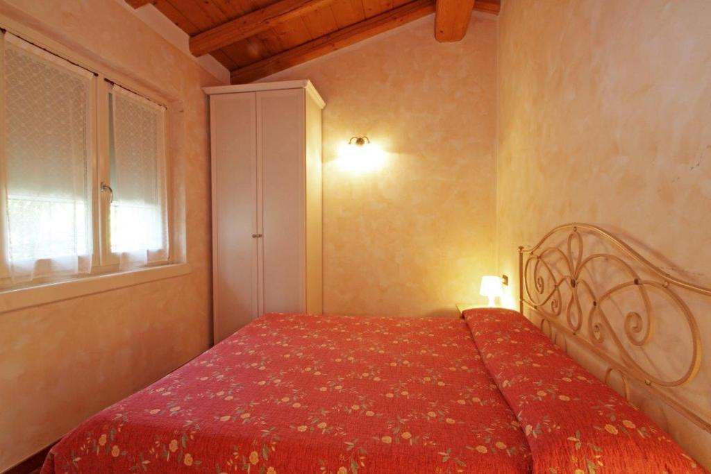 Postel nebo postele na pokoji v ubytování Cascina Le Preseglie