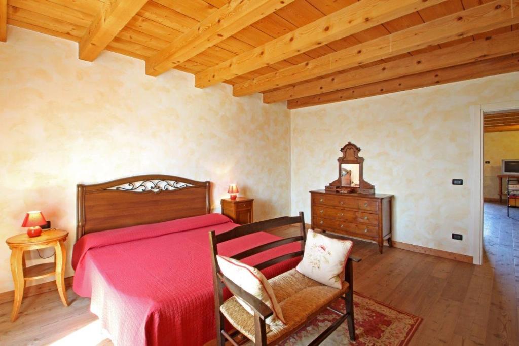 Postel nebo postele na pokoji v ubytování Cascina Le Preseglie