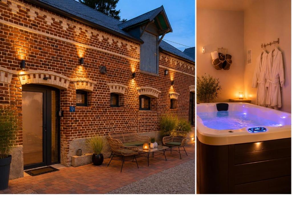 a brick building with a hot tub and a patio at Gîte 4 étoiles avec SPA privatif in Méaulte