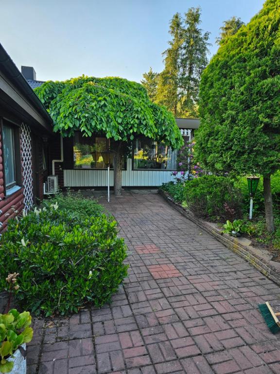 a brick driveway in front of a house at Sandmo Holiday Home 13 in Eckerö