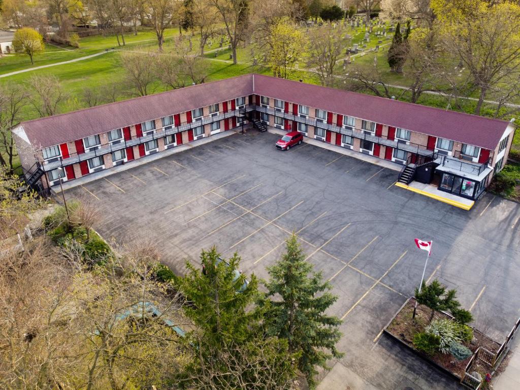 an overhead view of a building with a parking lot at Grand Persepolis Inn in Niagara Falls
