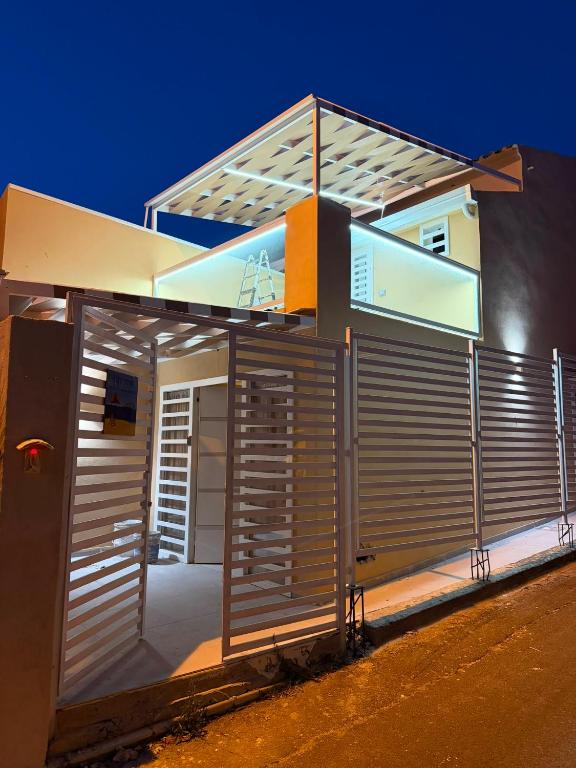a modern house with a metal garage at Mare D'amare in Diamante