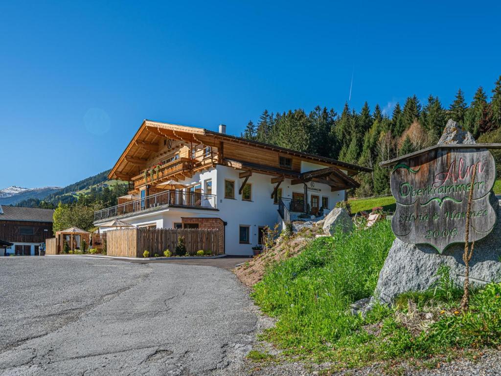 a house on the side of a road at Premium Apartment Almrausch in Hollersbach im Pinzgau