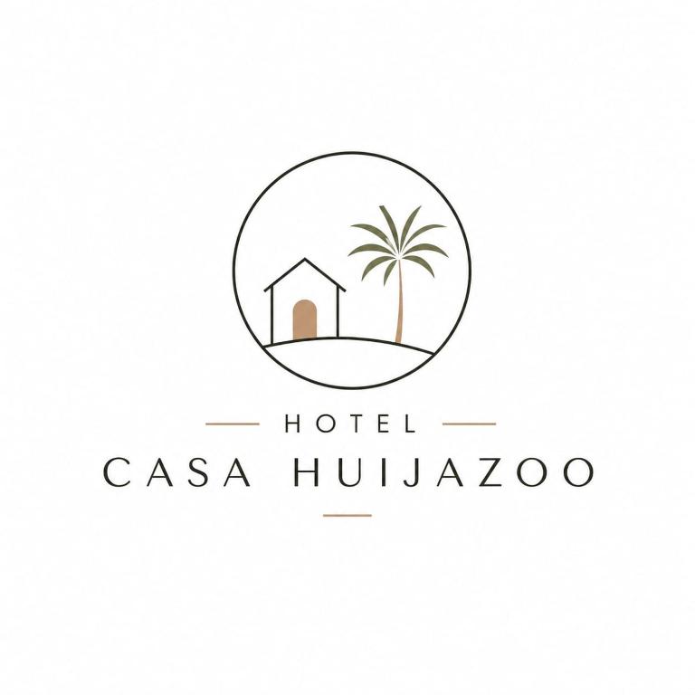 a hotel logo with a palm tree and a building at Hotel Casa Huijazoo in Mazunte