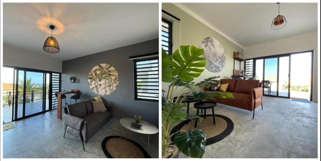 a living room with a couch and a table at Apartment Jayhden or Chloé New Stay & Pool with Ocean View Curaçao in Grote Berg