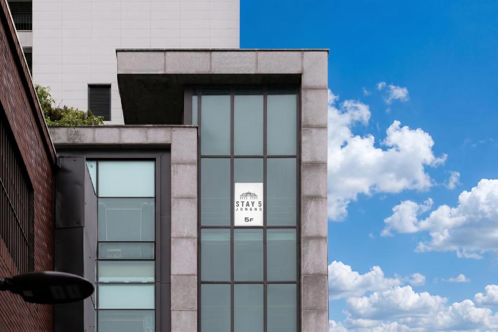 a building with a sign on the side of it at Stay5 Jongno in Seoul