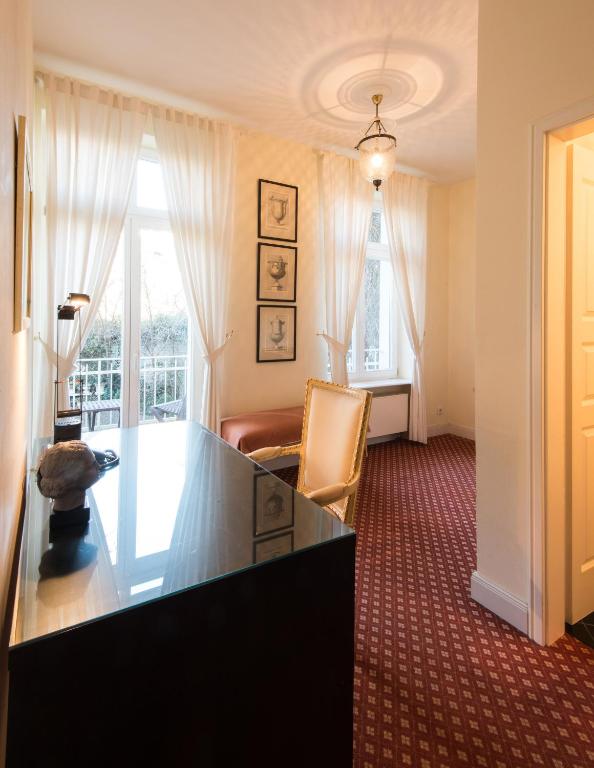 Uma área de estar em DIRAZI Guesthouse & Apartments GmbH