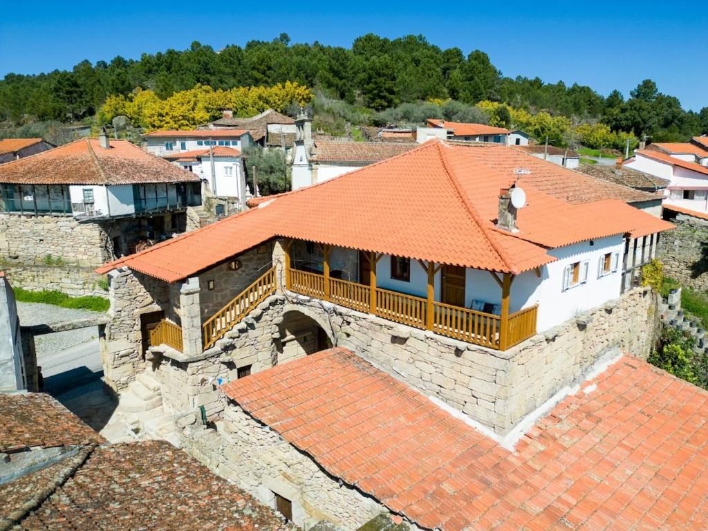 an overhead view of a building with an orange roof at Casa da Sequeirinha in Barreiros