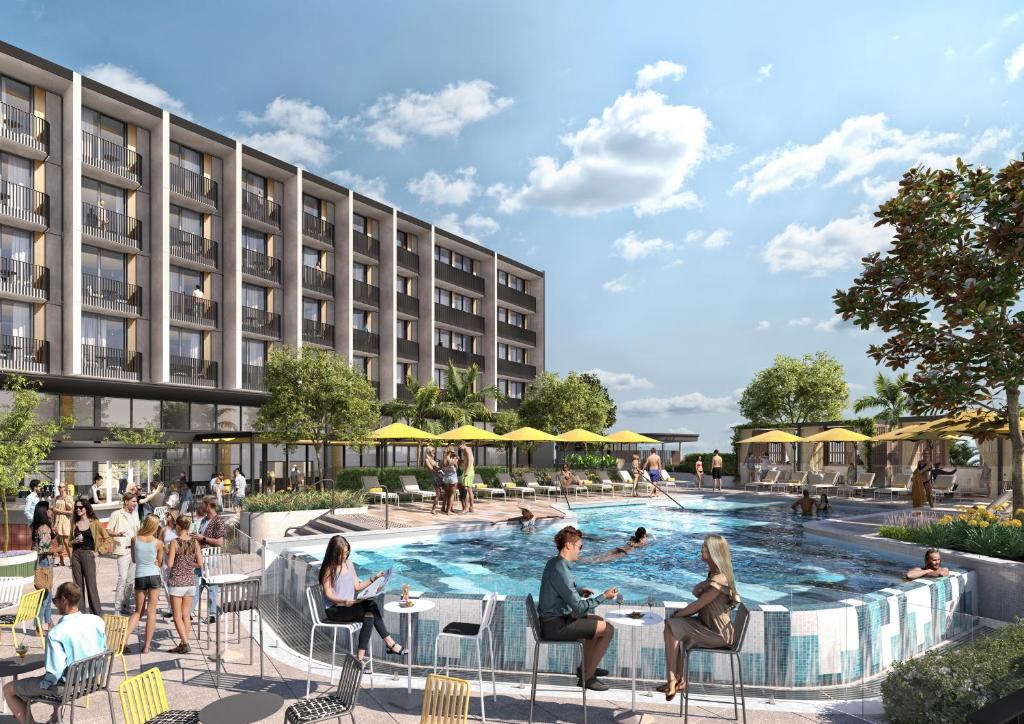 an architectural rendering of a hotel with a pool at Atura Oran Park in Gledswood Hills