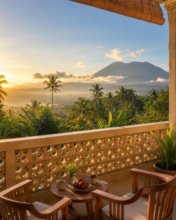 a table on a balcony with a view of a mountain at Double view point sibetan in Tenganan