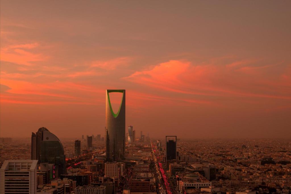 a view of a city skyline at sunset at Hyatt Regency Riyadh Olaya in Riyadh