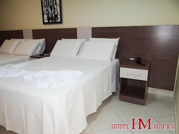 Postel nebo postele na pokoji v ubytování Hotel Moura