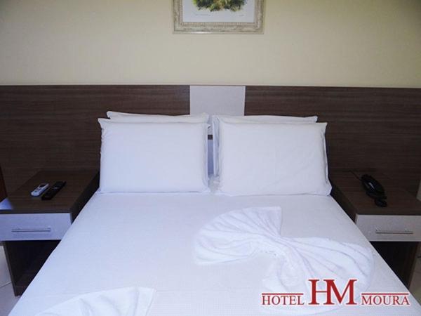Postel nebo postele na pokoji v ubytování Hotel Moura