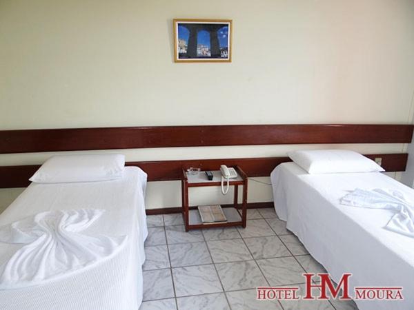 Postel nebo postele na pokoji v ubytování Hotel Moura