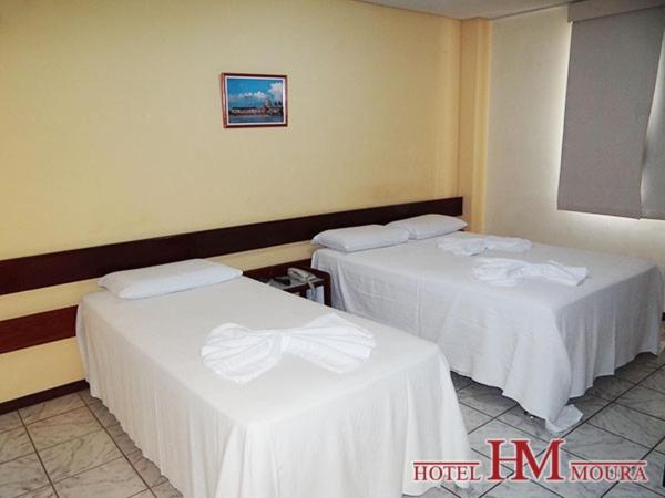 Postel nebo postele na pokoji v ubytování Hotel Moura