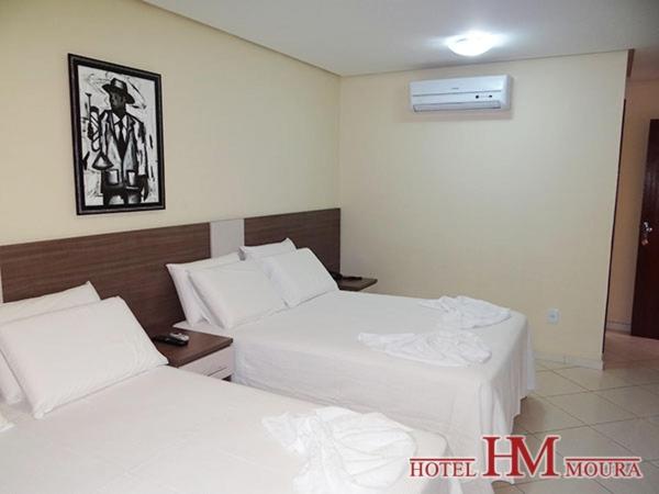 Postel nebo postele na pokoji v ubytování Hotel Moura