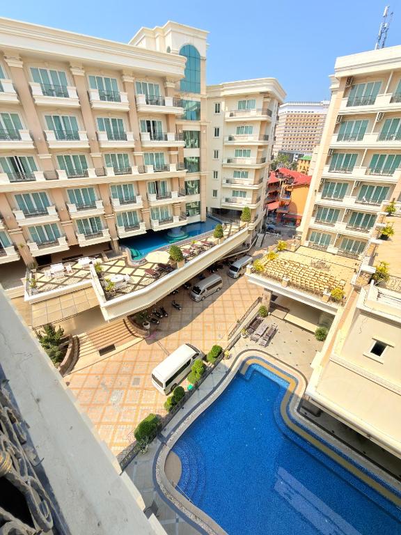 an overhead view of a building with a swimming pool at CT Suite in Pattaya South