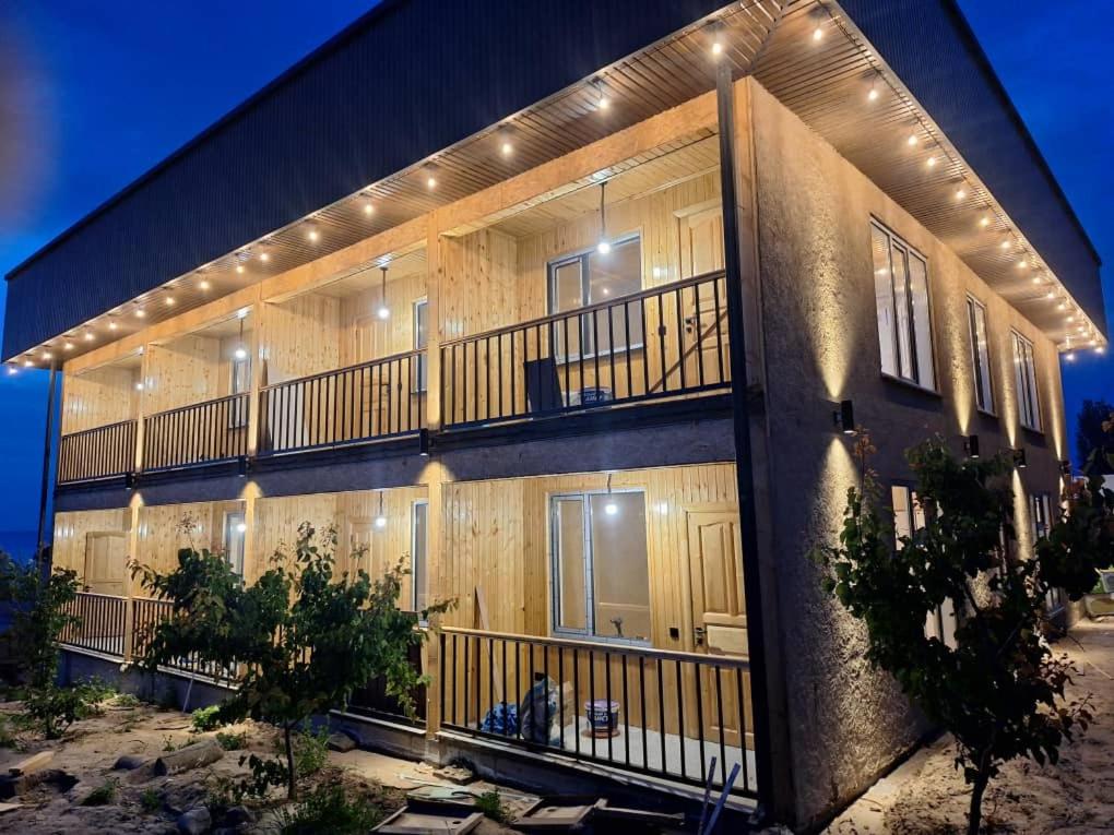 a building with lights on the side of it at Sarala Resort in Ostrov Kayrak