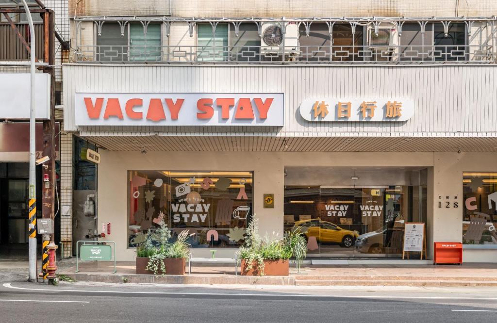 a view of a vayev stay store on a city street at 休日行旅 Vacay Stay in Tainan