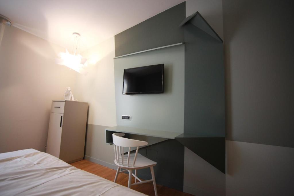 TV a/nebo společenská místnost v ubytování Hotel Corte Quadri
