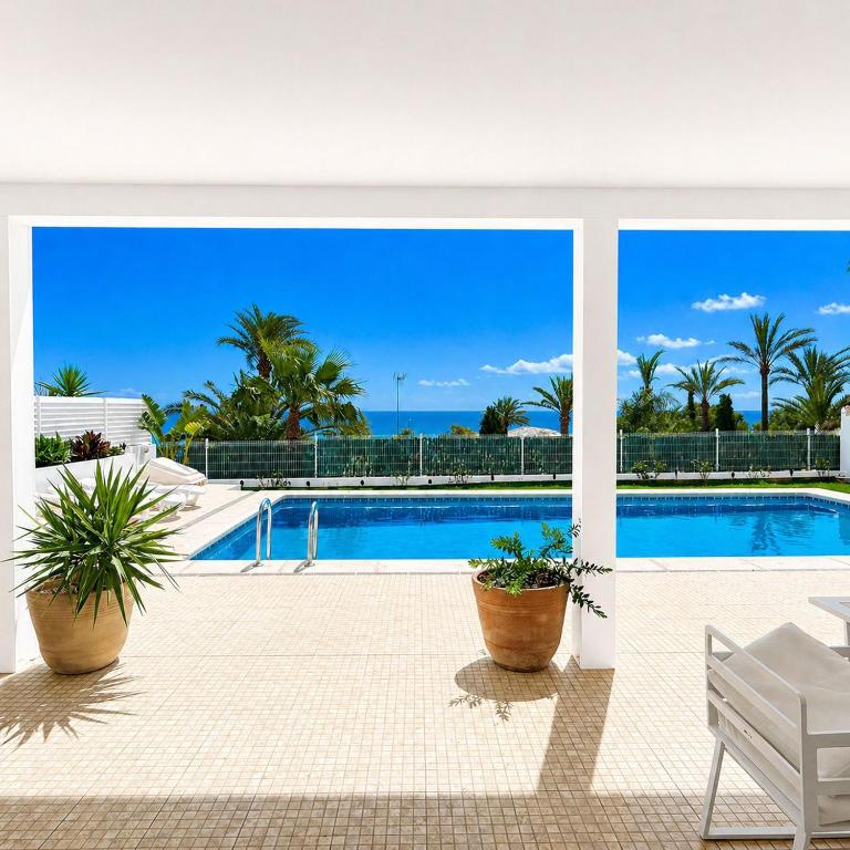 a view of a swimming pool from a house at Villa Mar by Azahar Stay in Alcossebre