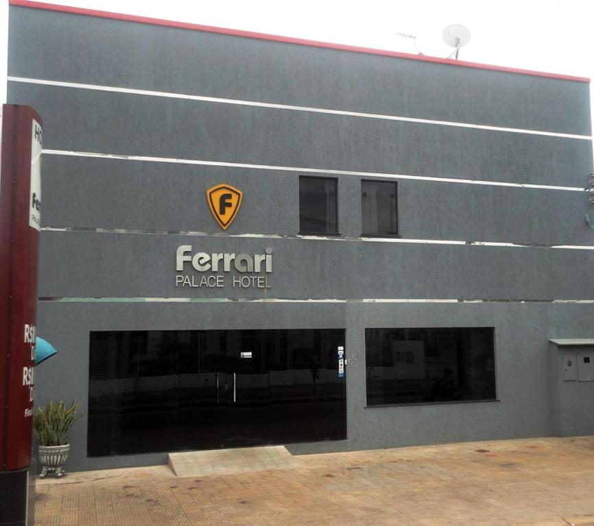a front view of a building with a renault palace hotel at Ferrari Palace Hotel in Boa Vista