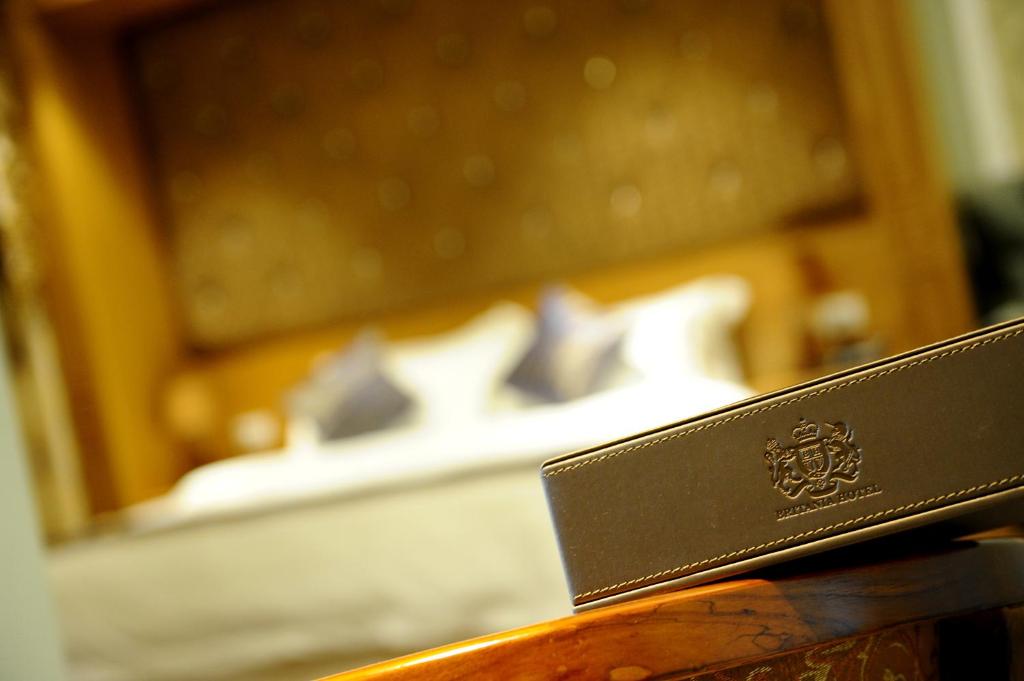 Postel nebo postele na pokoji v ubytování Hotel Britania