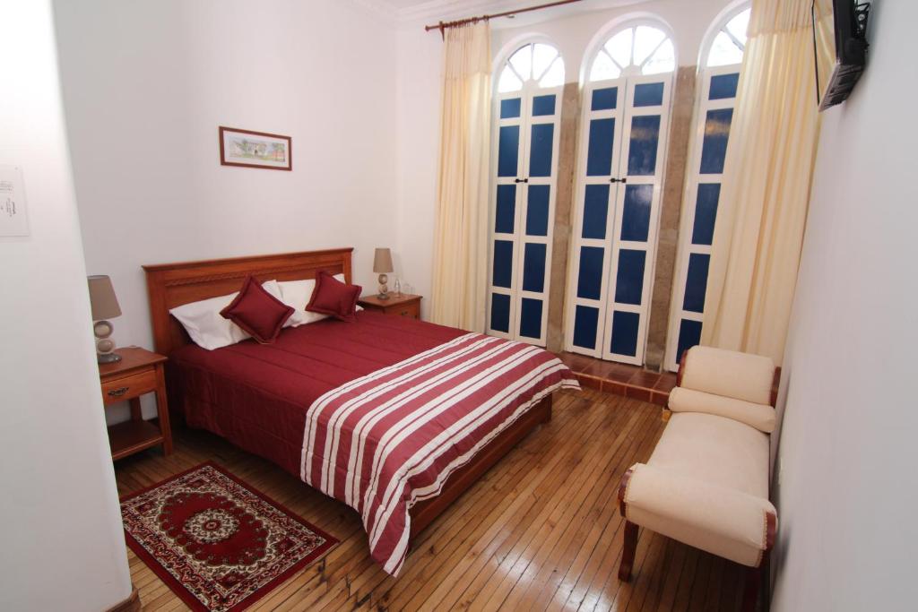 Postel nebo postele na pokoji v ubytování Casa Hotel Las Plazas